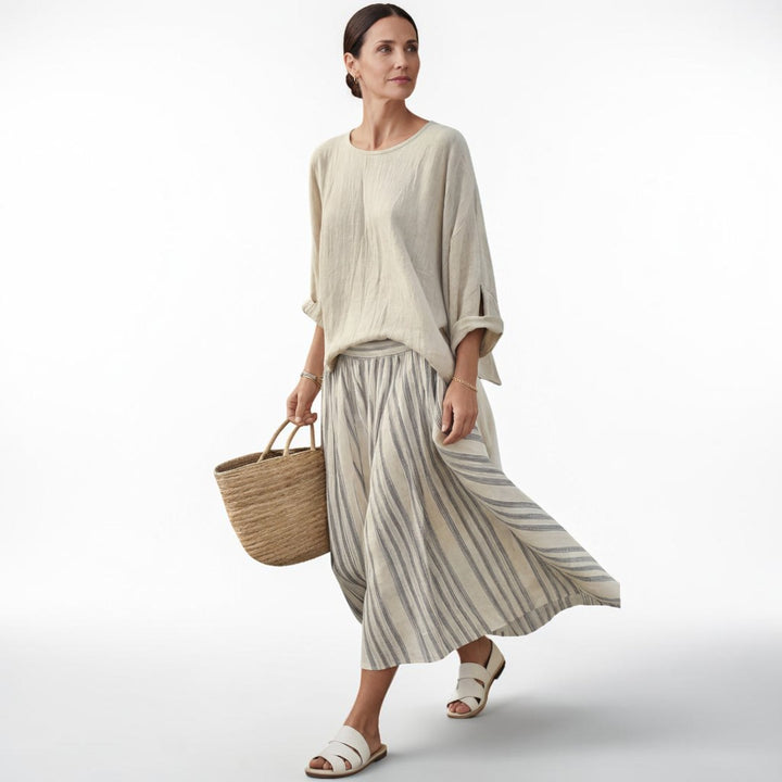 Aurora — Blusa cómoda y falda midi a rayas